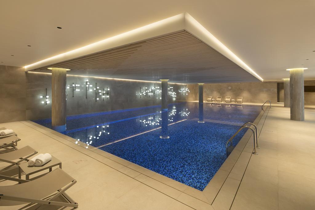 Tangla Hotel Brussels Kraainem Exterior foto The swimming pool at The Dorchester